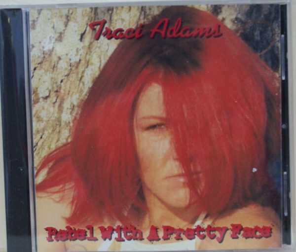TRACI ADAMS - REBEL WITH A PRETTY FACE - CD  - BRAND NEW